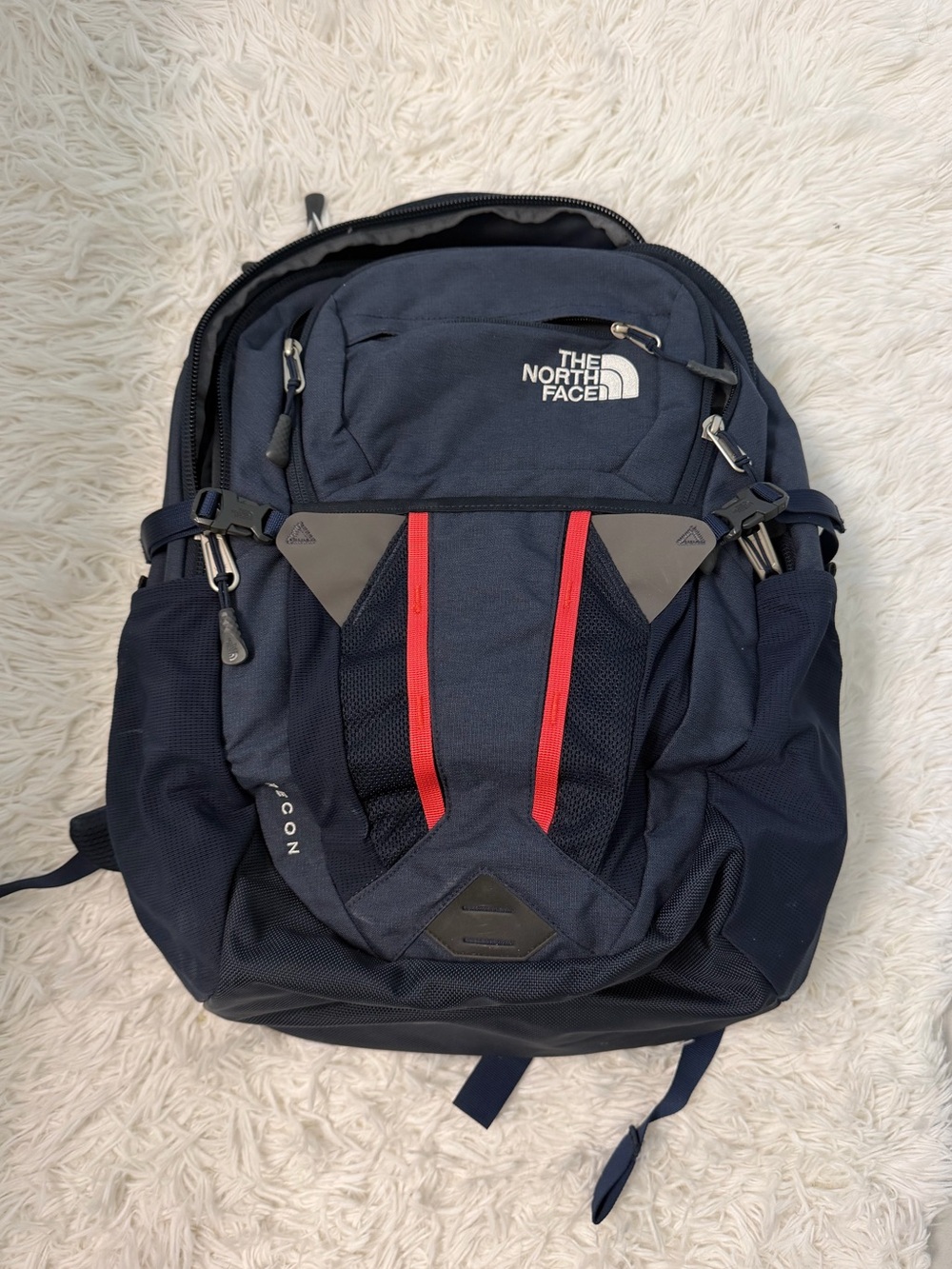 The North Face Navy Blue Backpack with Pink Trim